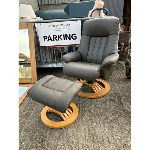 167 - A brown leather effect reclining chair together with stool