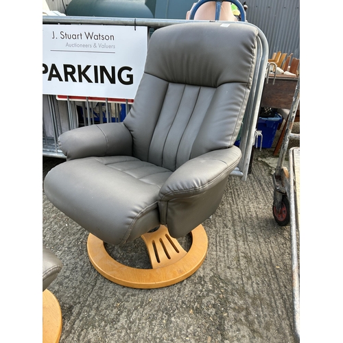 167 - A brown leather effect reclining chair together with stool