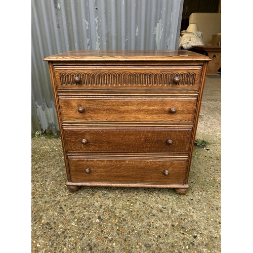 200 - A oak linenfold chest of four 80cm wide