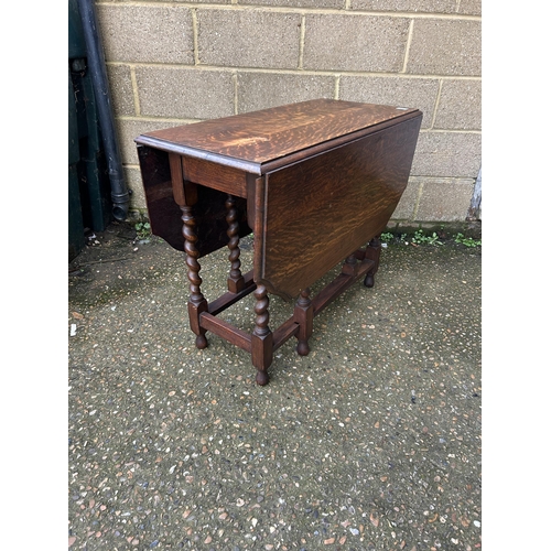 31 - An oak barley twist gateleg table