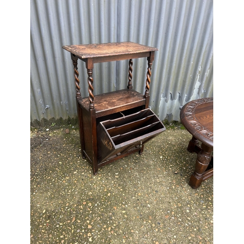 32 - A barley twist oak magazine table together with a carved oak coffee table