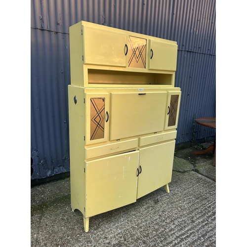 39 - A large yellow painted vintage kitchen cabinet 120x40x180