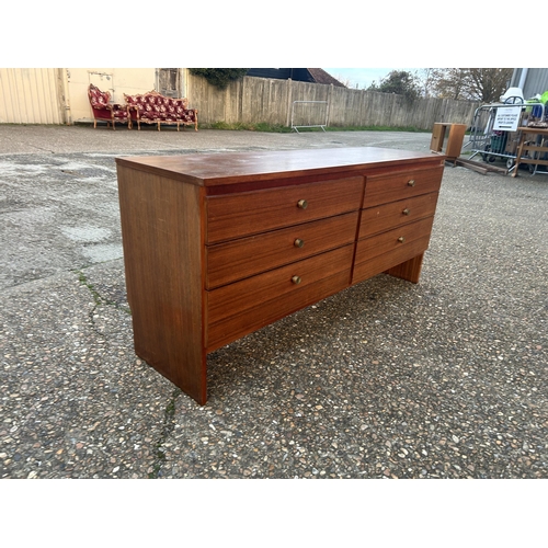 40 - A teak lowboy chest of six drawers 142x40 x62