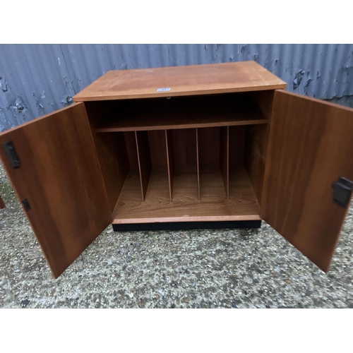 47 - A teak two door record cabinet