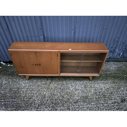 57 - A retro light oak side by side bookcase cupboard  153x26x77