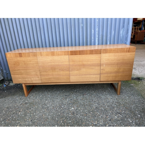 61 - A danish style teak four door sideboard 190x45 x77