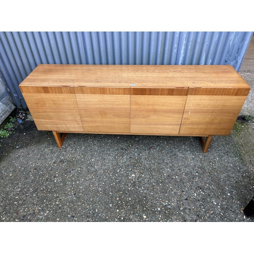 61 - A danish style teak four door sideboard 190x45 x77