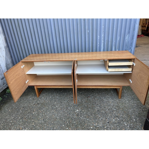 61 - A danish style teak four door sideboard 190x45 x77