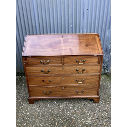 68 - A Victorian mahogany   bureau with fitted interior (missing handle in office) 107x50x110