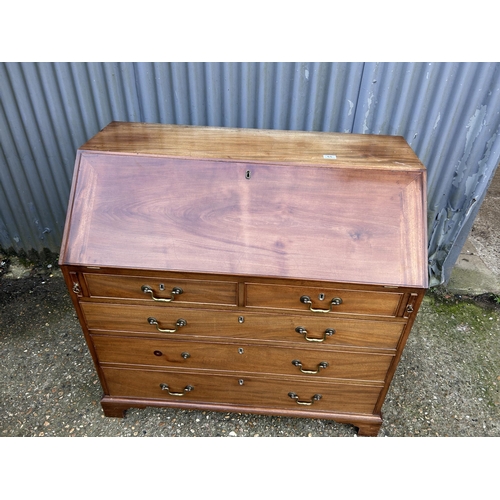 68 - A Victorian mahogany   bureau with fitted interior (missing handle in office) 107x50x110