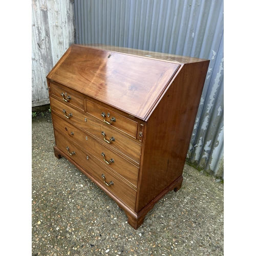 68 - A Victorian mahogany   bureau with fitted interior (missing handle in office) 107x50x110