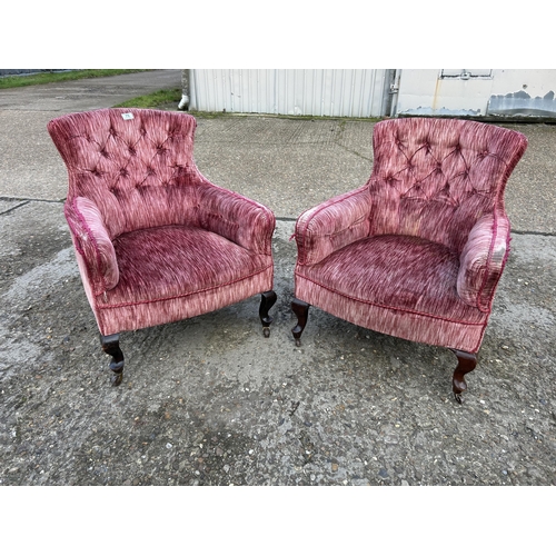 75 - A pair of Edwardian pink upholstered button back chairs