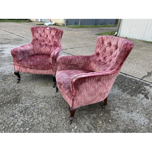 75 - A pair of Edwardian pink upholstered button back chairs