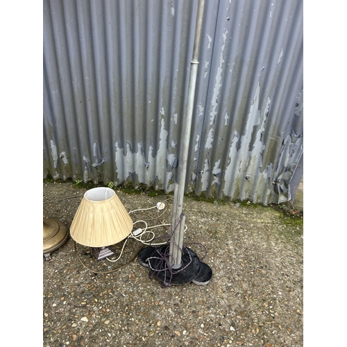 82 - A brass standard lamp, a deco style standard lamp and a table lamp