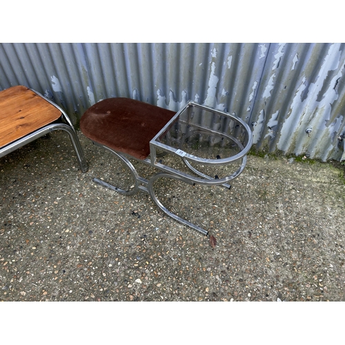 89 - A mid century chrome and smoked glass telephone seat together with a chrome framed coffee table