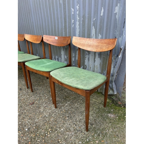 90 - A set of four mid century g plan teak diming chairs designed by KOFOD LARSEN marked to the underside