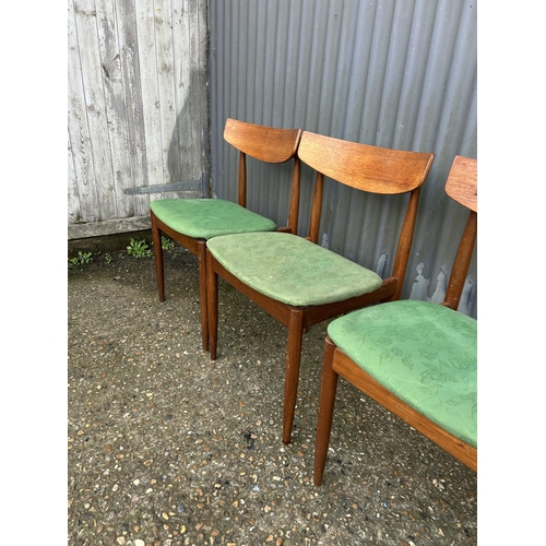 90 - A set of four mid century g plan teak diming chairs designed by KOFOD LARSEN marked to the underside