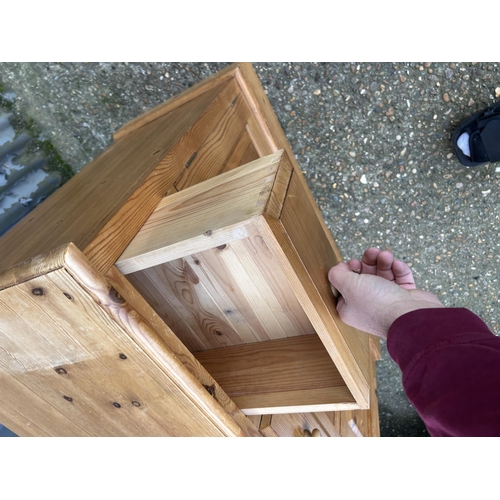 95 - A solid pine three drawer sideboard 120x45x90