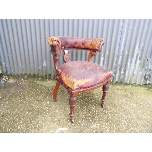 18 - A Victorian bow back office chair for restoration