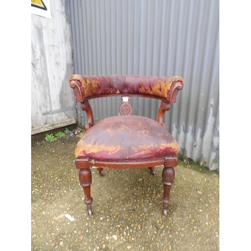 18 - A Victorian bow back office chair for restoration