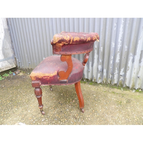 18 - A Victorian bow back office chair for restoration