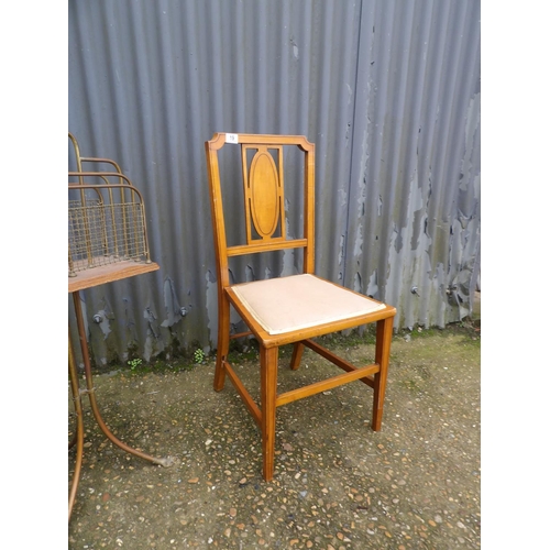 19 - A pair of satinwood chairs together with a brass magazine rack