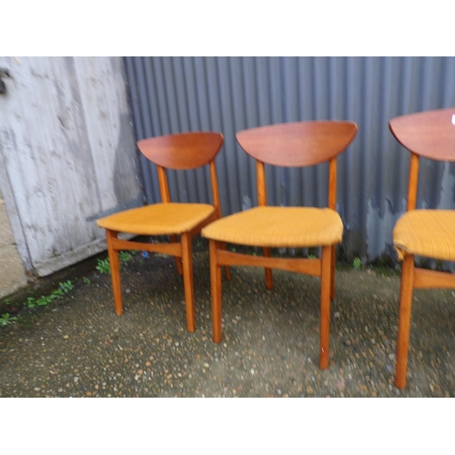 21 - A set of four mid century teak chairs