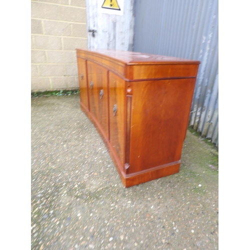 25 - A repro inverted bow front sideboard 180cm wide