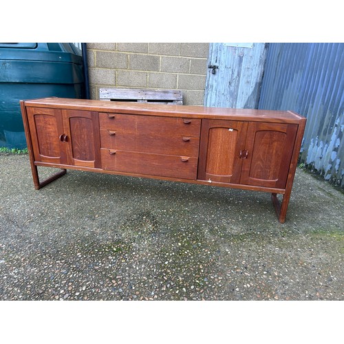 140 - A mid century teak sideboard 214x44x77