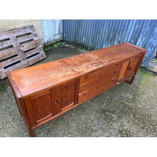 140 - A mid century teak sideboard 214x44x77