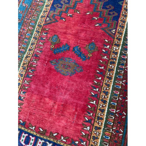 80 - A red and gold pattern oriental rug 190x100