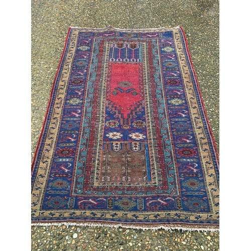 80 - A red and gold pattern oriental rug 190x100