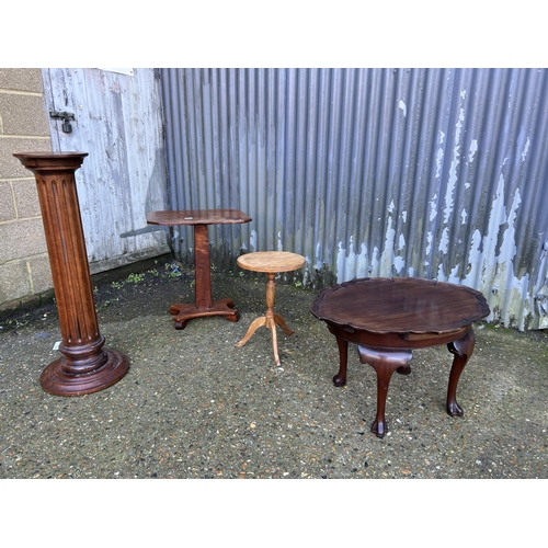 13 - A collection of mahogany side tables including plant stand, tray top table and tripod table