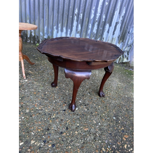 13 - A collection of mahogany side tables including plant stand, tray top table and tripod table