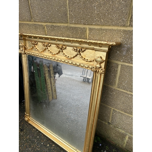 192 - A very large gold gilt over mantle mirror 120x120