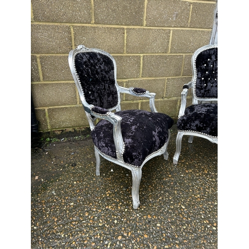 194 - A pair of silver gilt and black crush velvet chairs with diamantes