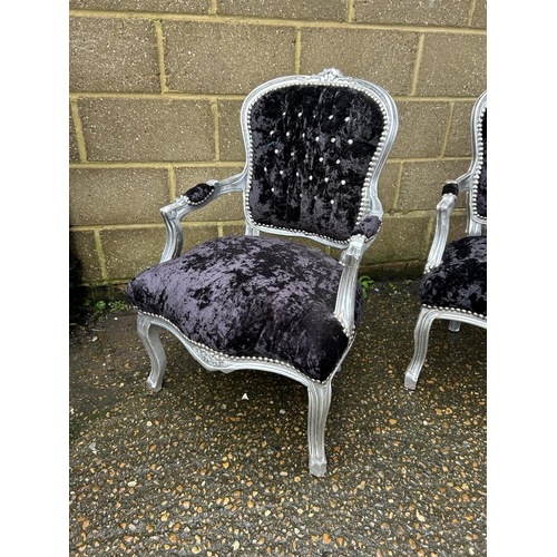 194 - A pair of silver gilt and black crush velvet chairs with diamantes