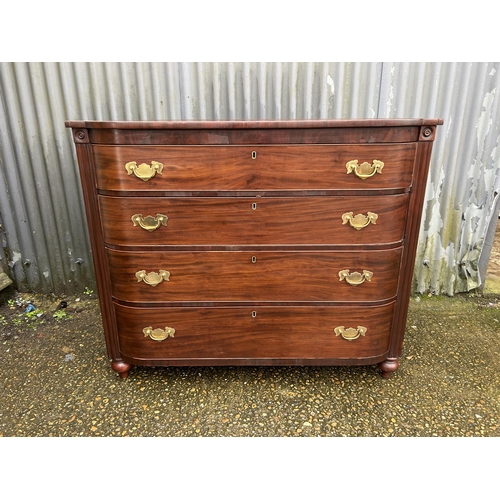 198 - A Victorian mahogany bow front chest of four drawers, recently refurbished with original key and rec... 