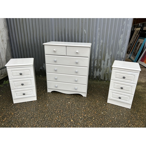 203 - A grey painted chest of five drawers together with two modern white bedside chests of three