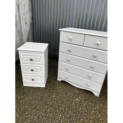 203 - A grey painted chest of five drawers together with two modern white bedside chests of three