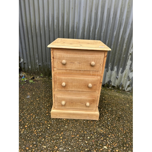 205 - A solid pine chest of four drawers 50 x45 x55