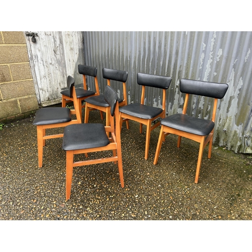 207 - A set of six mid century teak framed dining chairs