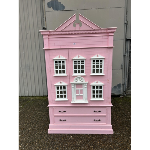 222 - A very large nursery wardrobe styled as a large pink dolls house 125x55x 177