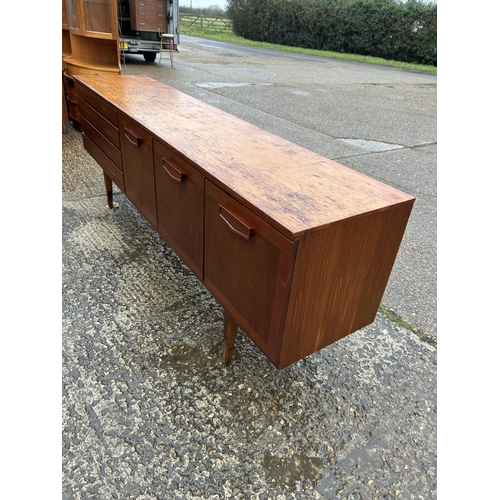 225 - A mid century teak sideboard 216 x46x80