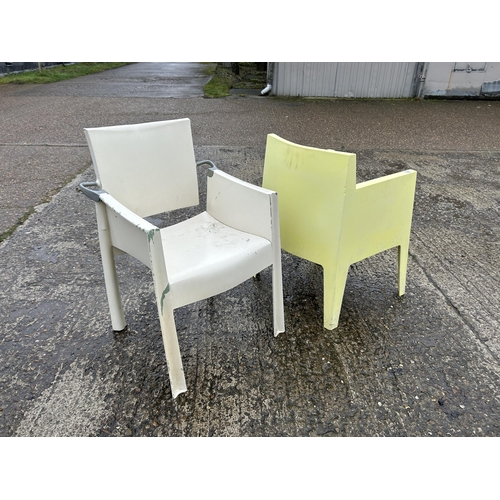 231 - Two retro plastic garden chairs