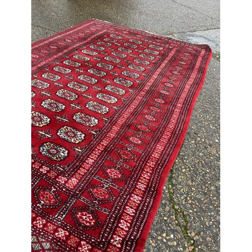 235 - A good quality red pattern carpet  168x250