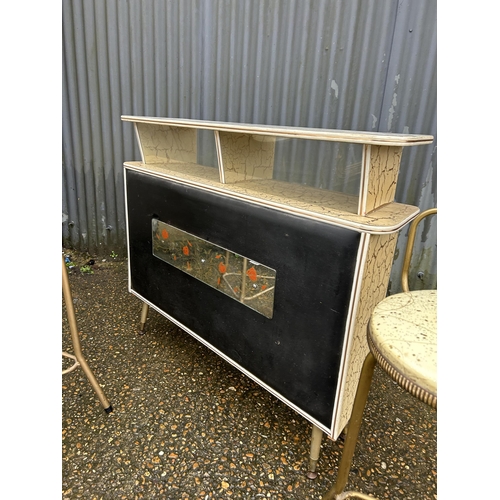 244 - A mid century Formica and vinyl bar together with 2 stools