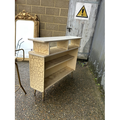 244 - A mid century Formica and vinyl bar together with 2 stools