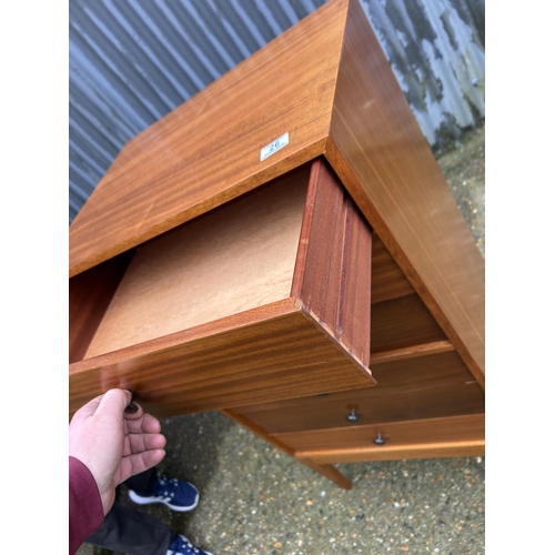 26 - A mid century teak and rosewood tallboy chest of drawers by UNIFLEX 62x34x120