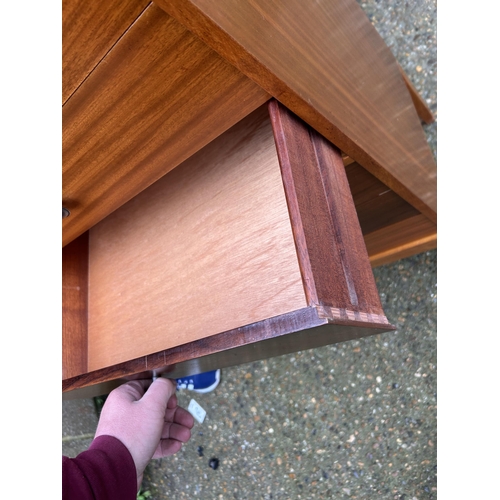 26 - A mid century teak and rosewood tallboy chest of drawers by UNIFLEX 62x34x120